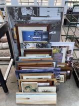 A LARGE ASSORTMENT OF FRAMED AND UNFRAMED PRINTS AND PICTURES