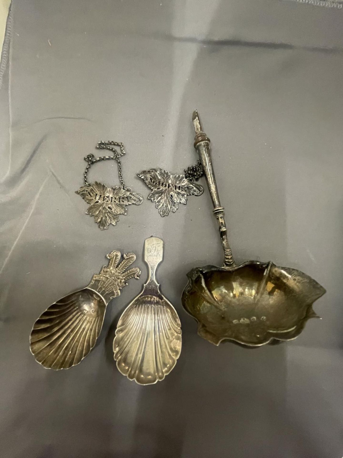 FIVE ITEMS OF HALLMARKED SILVER TO INCLUDE A THREE FEATHER S SPOON, SHERRY AND MADEIRA DECANTER
