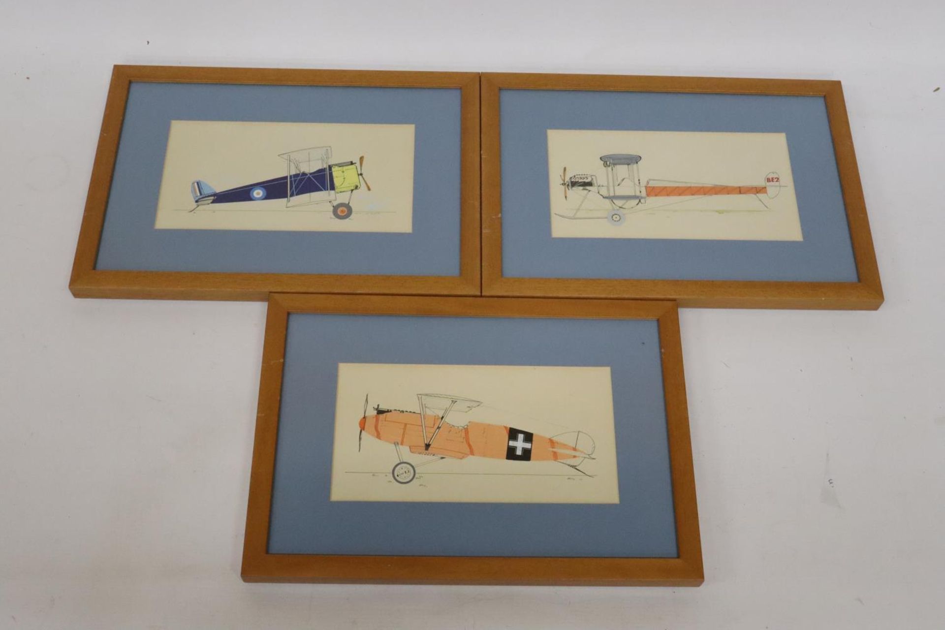 THREE FRAMED PICTURES OF WORLD WAR I FIGHTER PLANES, 13.5 X 25CM