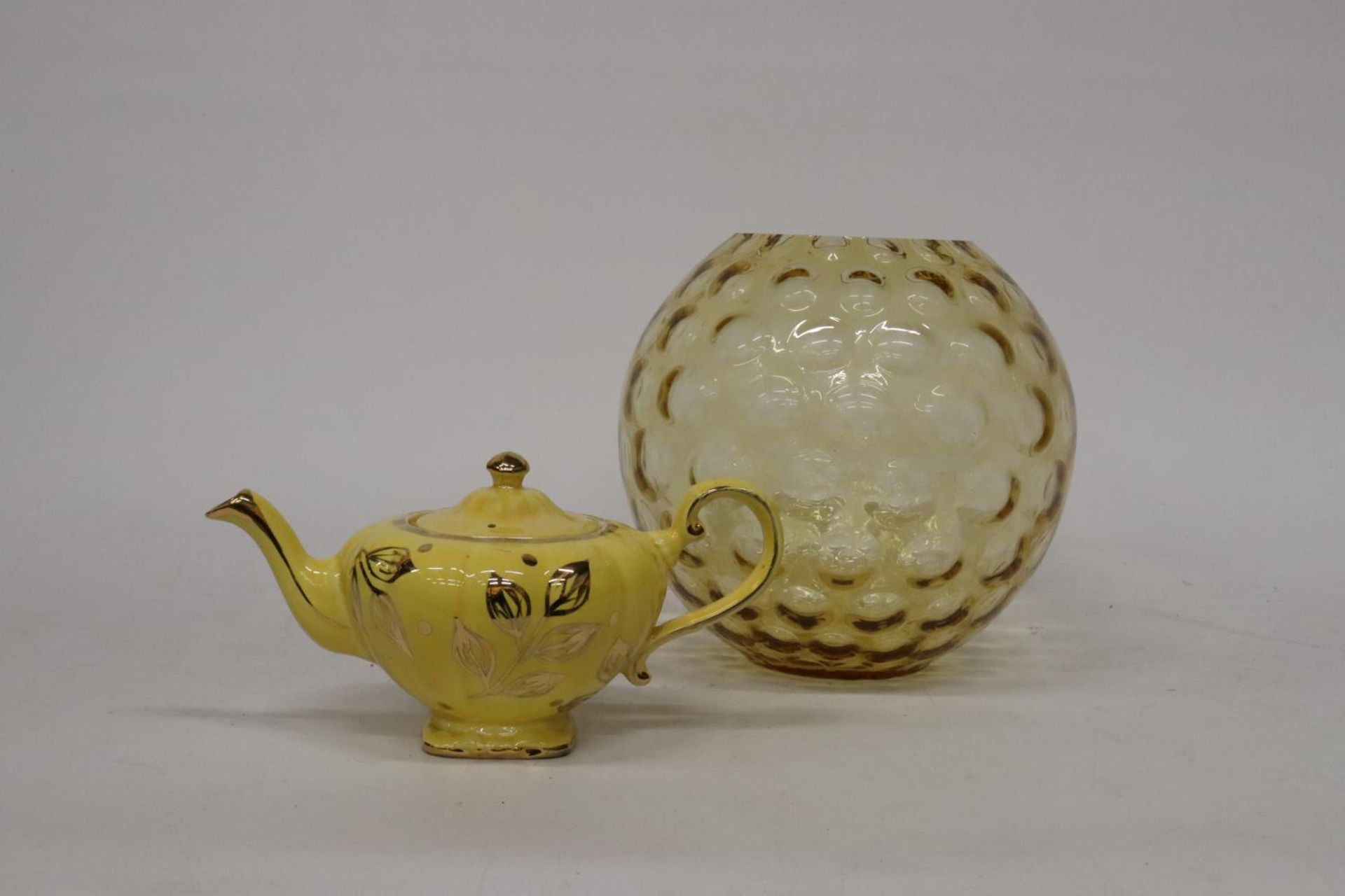 AN ARTHUR WOODS TEAPOT AND A LARGE RETRO GLASS BOWL