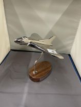 A SOLID CHUNKY MODEL OF A VULCAN ON A HARDWOOD BASE WITH HISTORY PLAQUE, HEIGHT 20CM