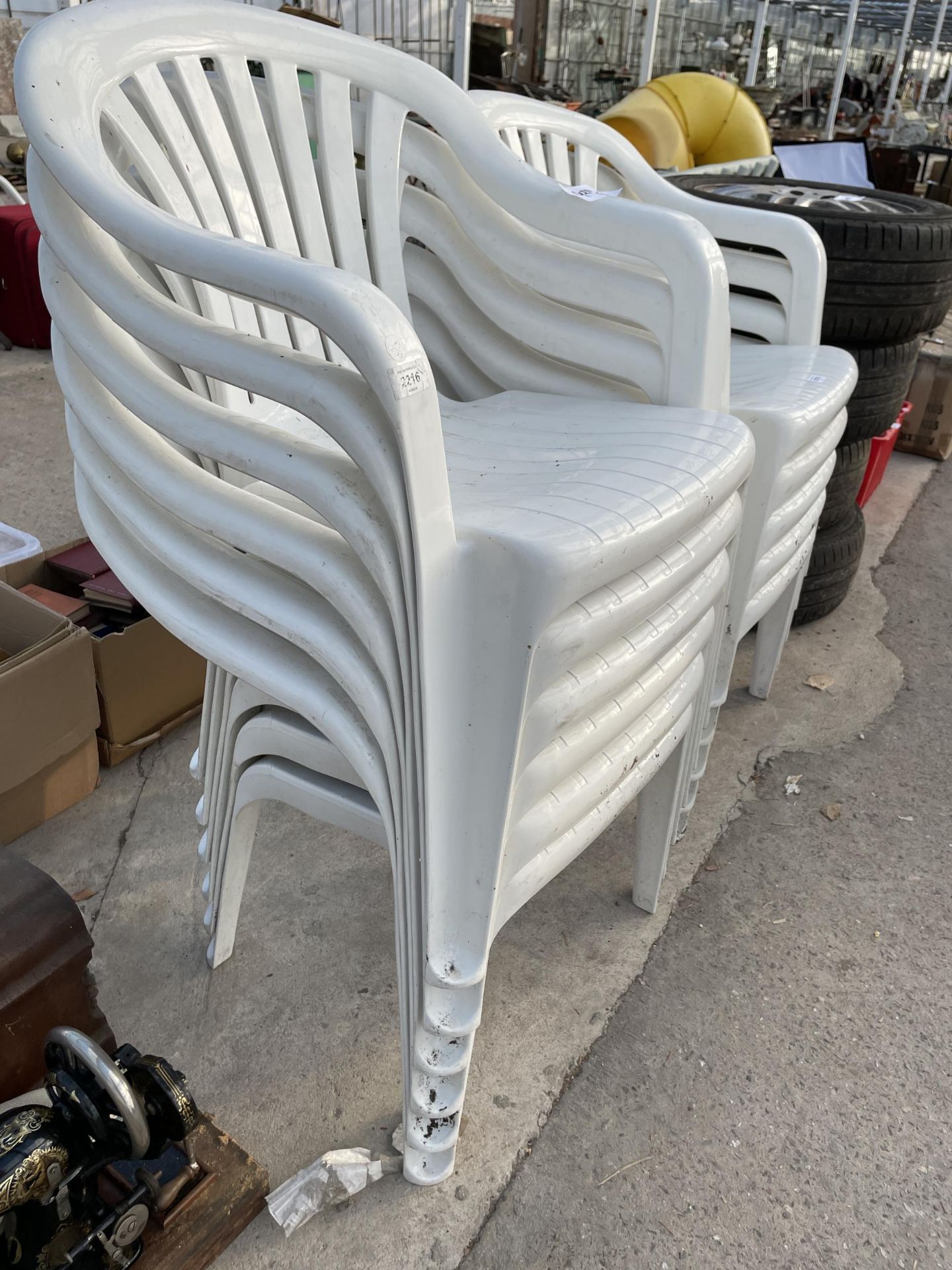 ELEVEN WHITE PLASTIC STACKING GARDEN CHAIRS - Image 2 of 2