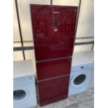 A RED BEKO THREE SECTION UPRIGHT FRIDGE FREEZER