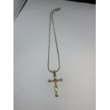 A SWAROVSKI CRYSTAL CRUCIFIX ON A CHAIN