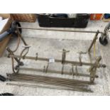 A VINTAGE BRASS TRAIN LUGGAGE RACK AND COAT HOOKS