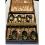 A SET OF SIX HALLMARKED SILVER BOWLING THEMED SPOONS IN A PRESENTATION BOX