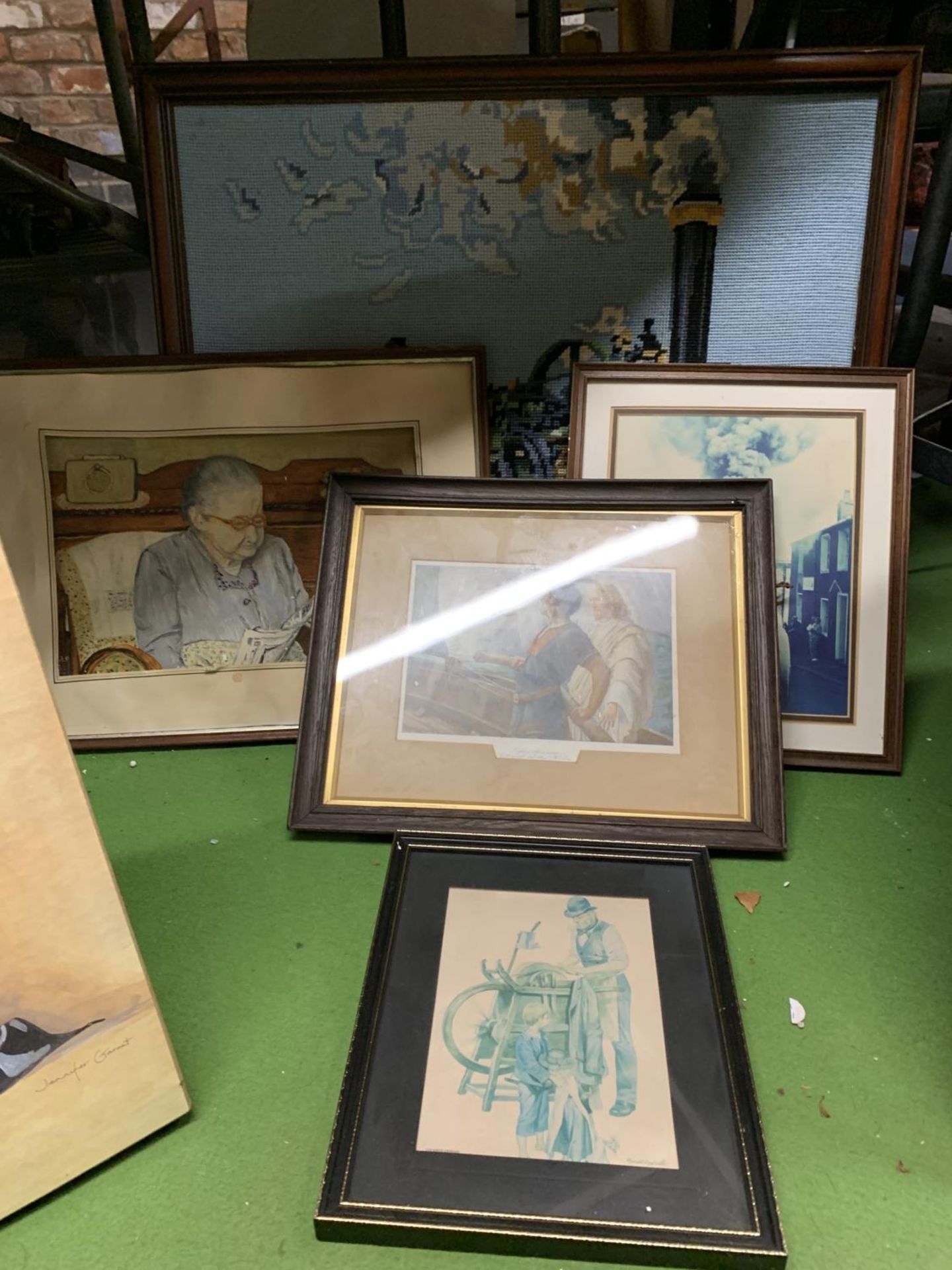 A LARGE TAPESTRY OF A TRACTOR TOGETHER WITH FOUR FRAMED PRINTS