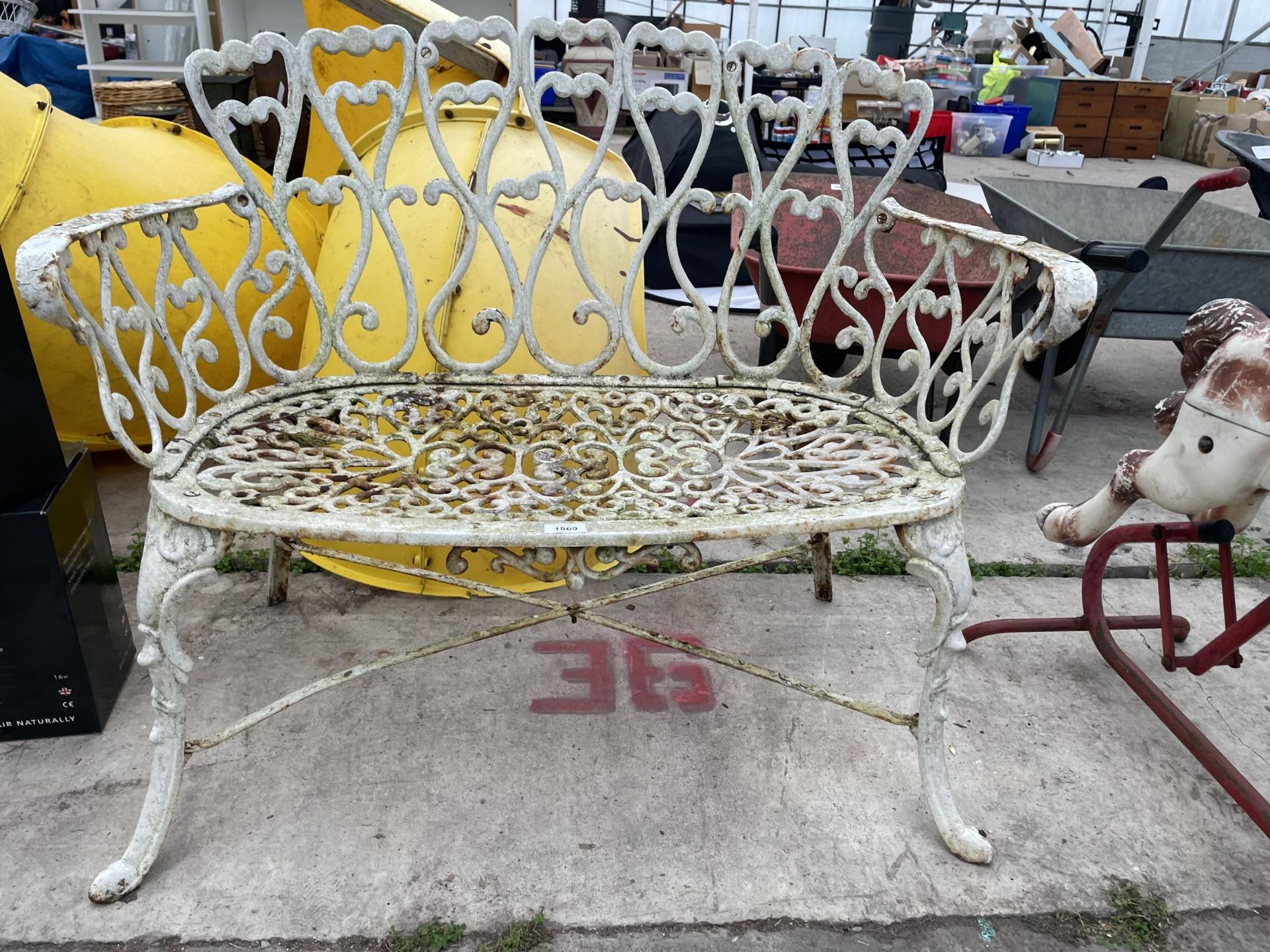 A VINTAGE WHITE PAINTED METAL TWO SEATER GARDEN BENCH - Image 2 of 2