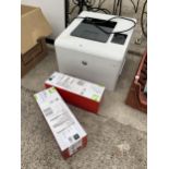 A HP COLOR LASERJET PRO M452NW PRINTER AND TWO TONER CARTRIDGES