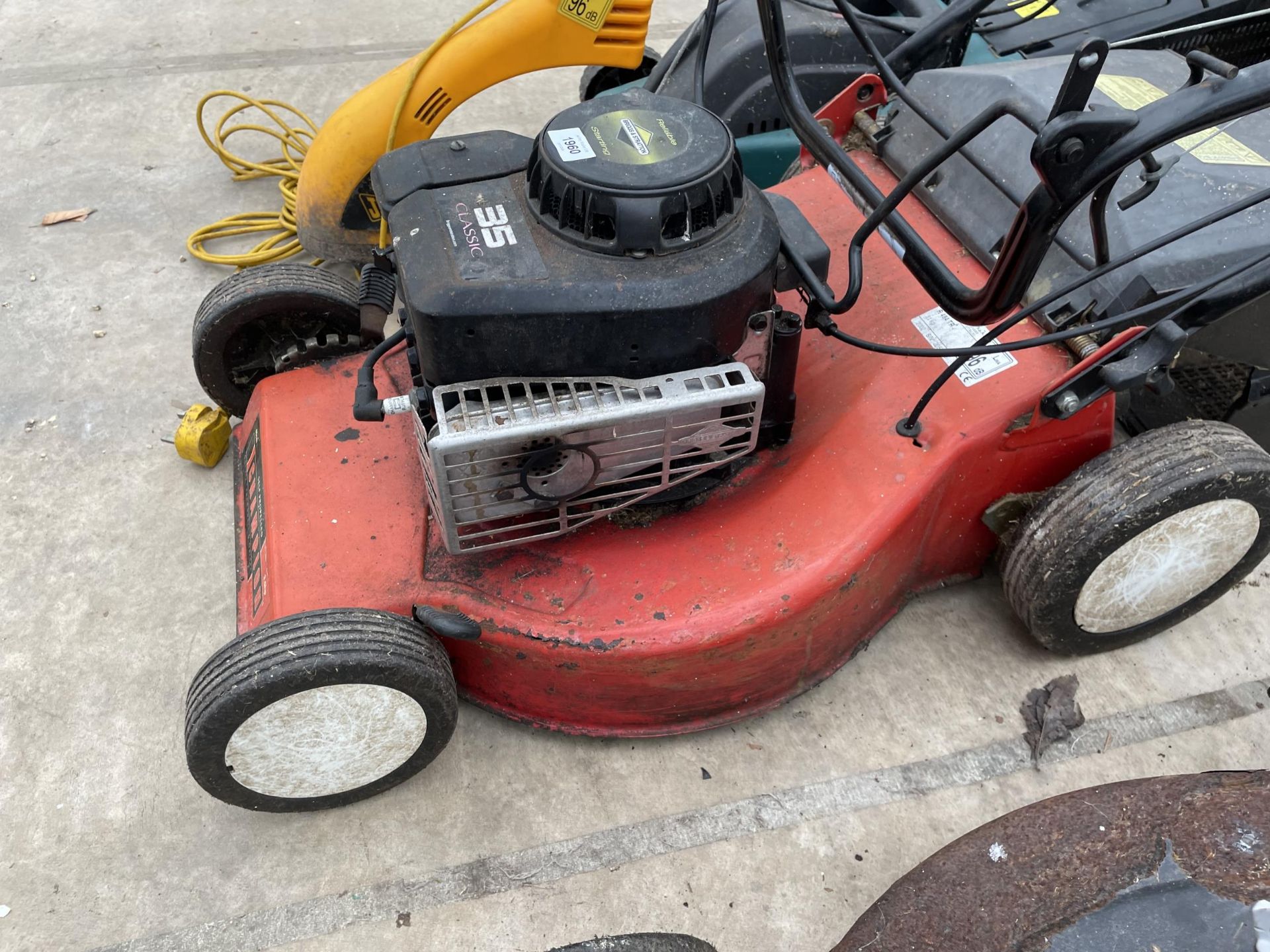 TWO LAWN MOWERS TO INCLUDE A CHAMPION PETROL ROTARY MOWER AND AN ELECTRIC JCB GRASS STRIMMER ETC - Image 5 of 5