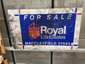 A VINTAGE WOODEN 'ROYAL LIFE ESTATES' FOR SALE SIGN