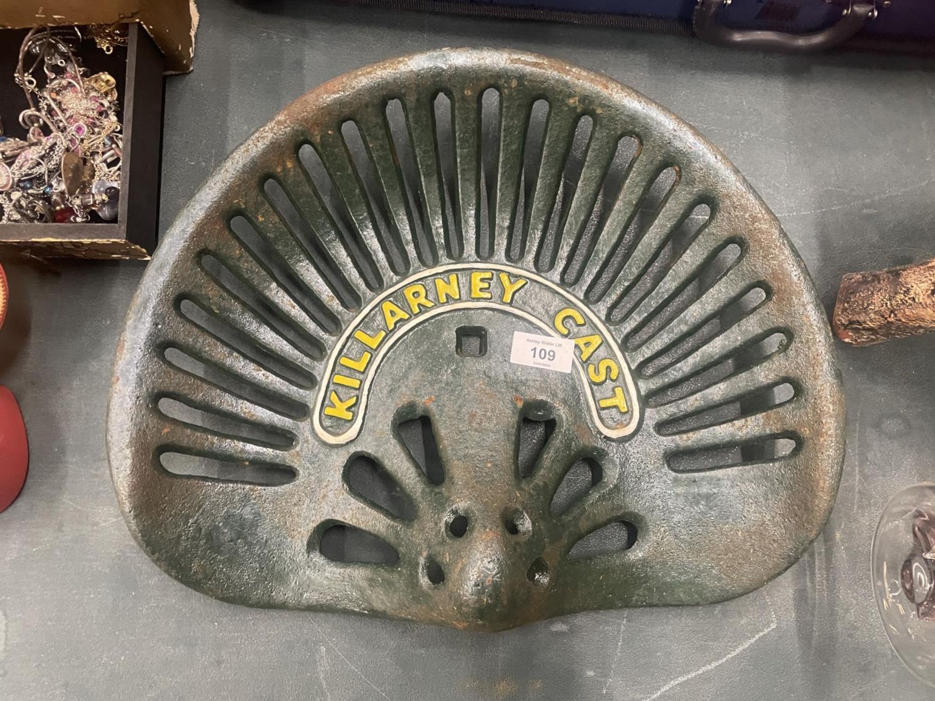 A KILLARNEY CAST GREEN TRACTOR SEAT