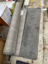 A MODERN GREY SHAGGY RUG