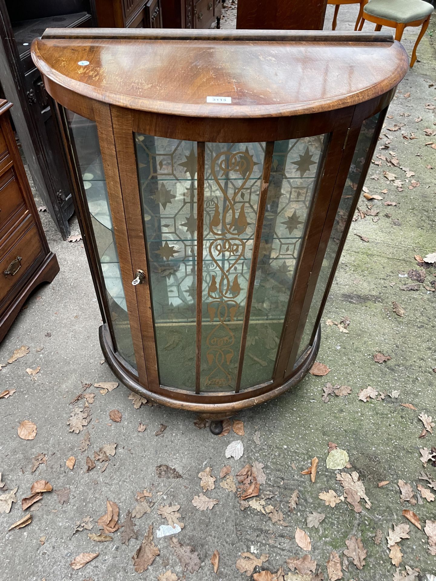 A MID 20TH CENTURY WALNUT BOW-FRONTED CHINA CABINET, 30" WIDE