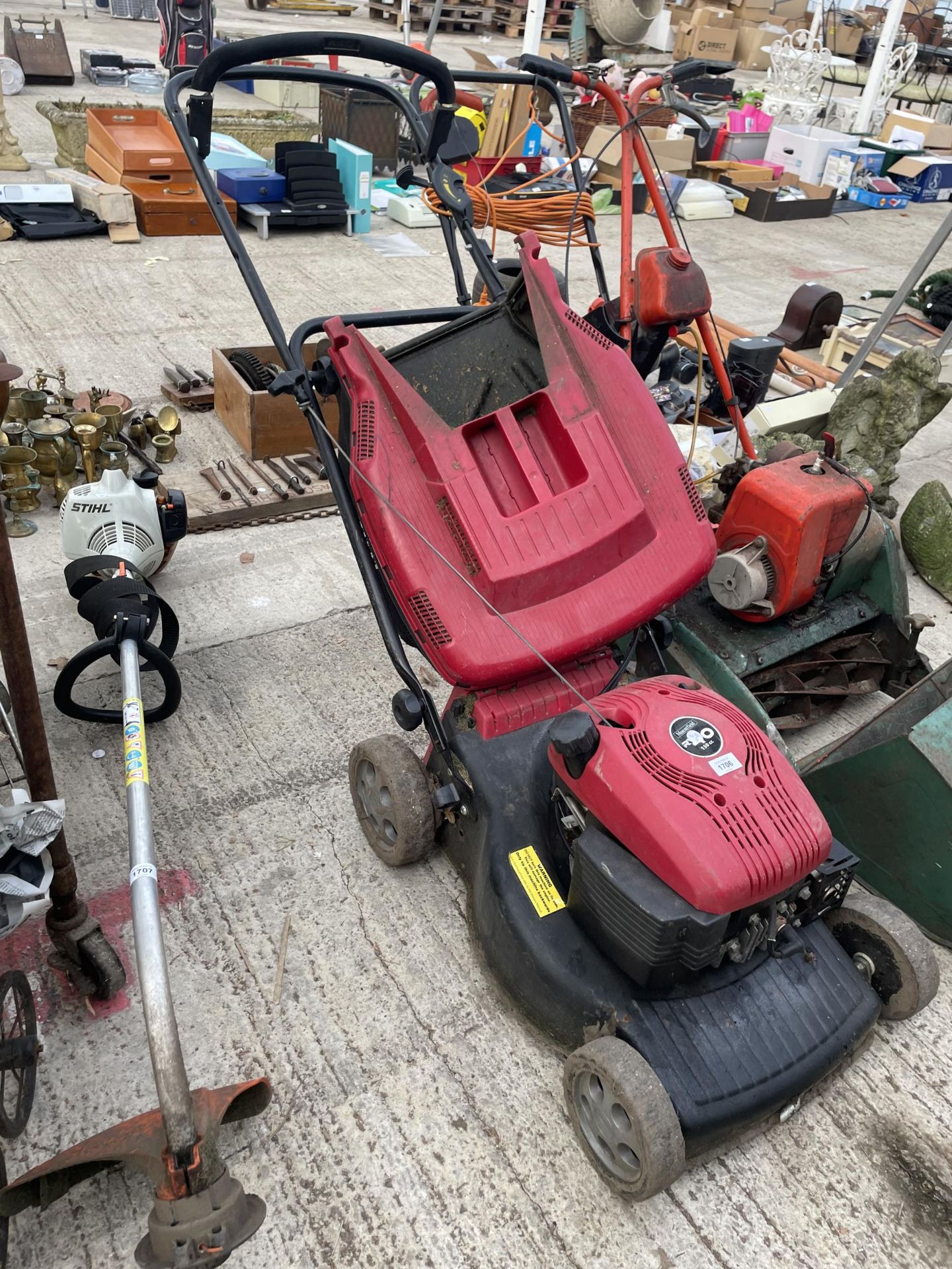 A MOUNTFIELD PETROL LAWN MOWER WITH GRASS BOX