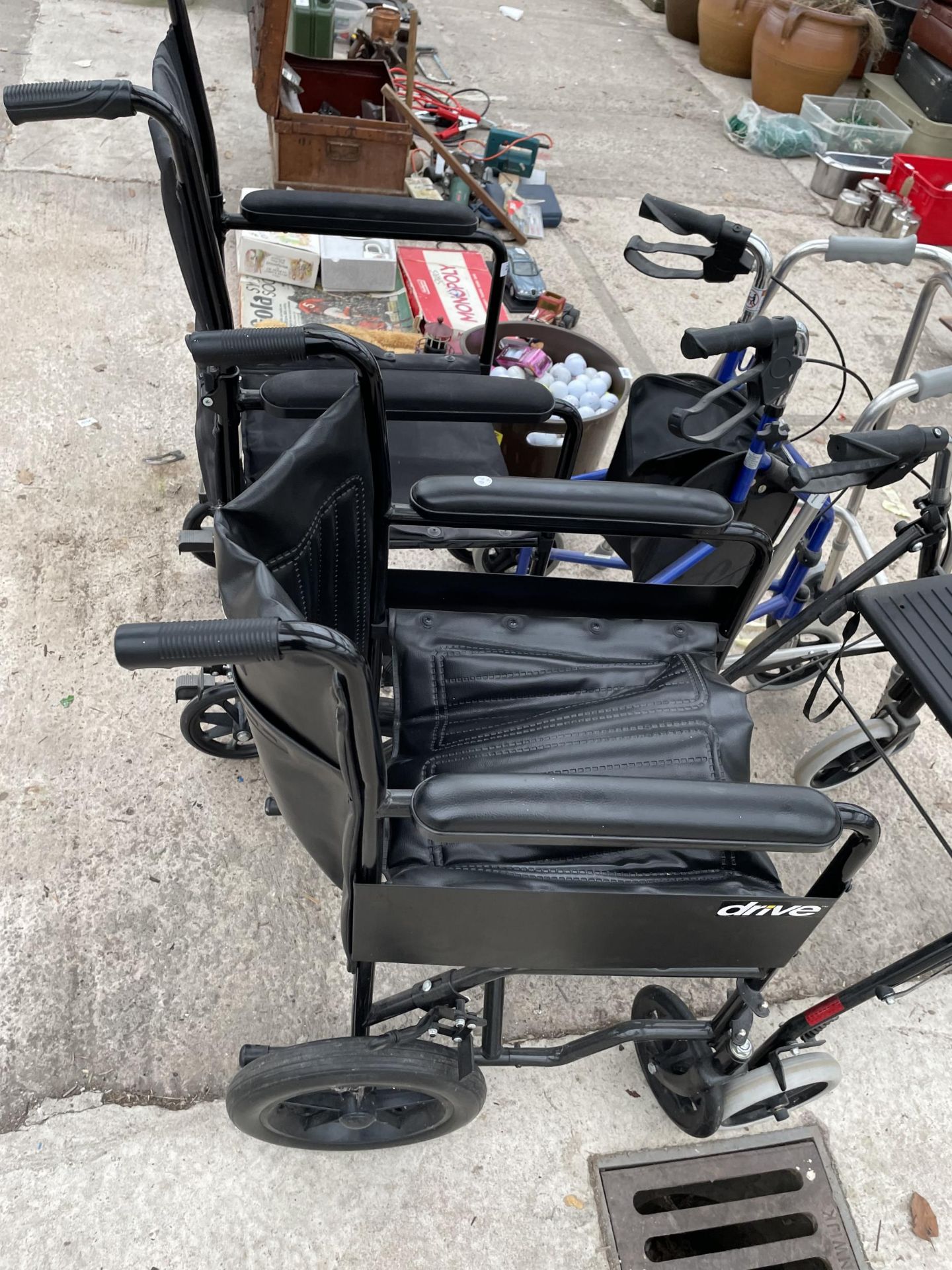 AN ASSORTMENT OF MOBILITY AIDS TO INCLUDE TWO WHEEL CHAIRS AND WALKING FRAMES ETC - Image 3 of 5