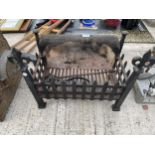 A VINTAGE CAST IRON FIRE GRATE AND TWO COMPANION ITEMS