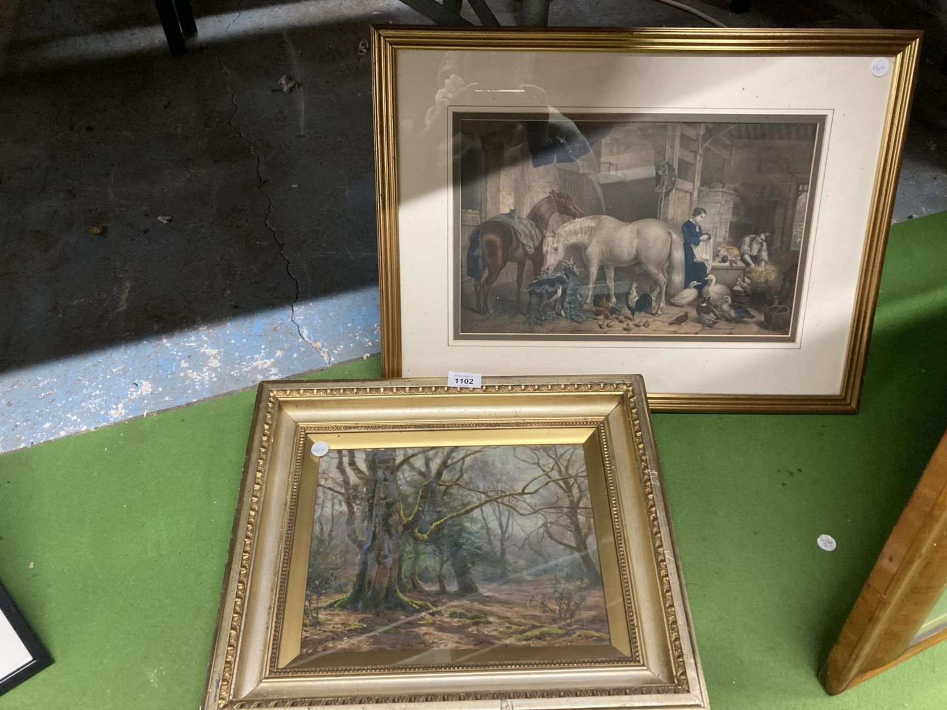 TWO FRAMED PRINTS, ONE OF A FOREST SCENE AND THE OTHER A FARMYARD SCENE