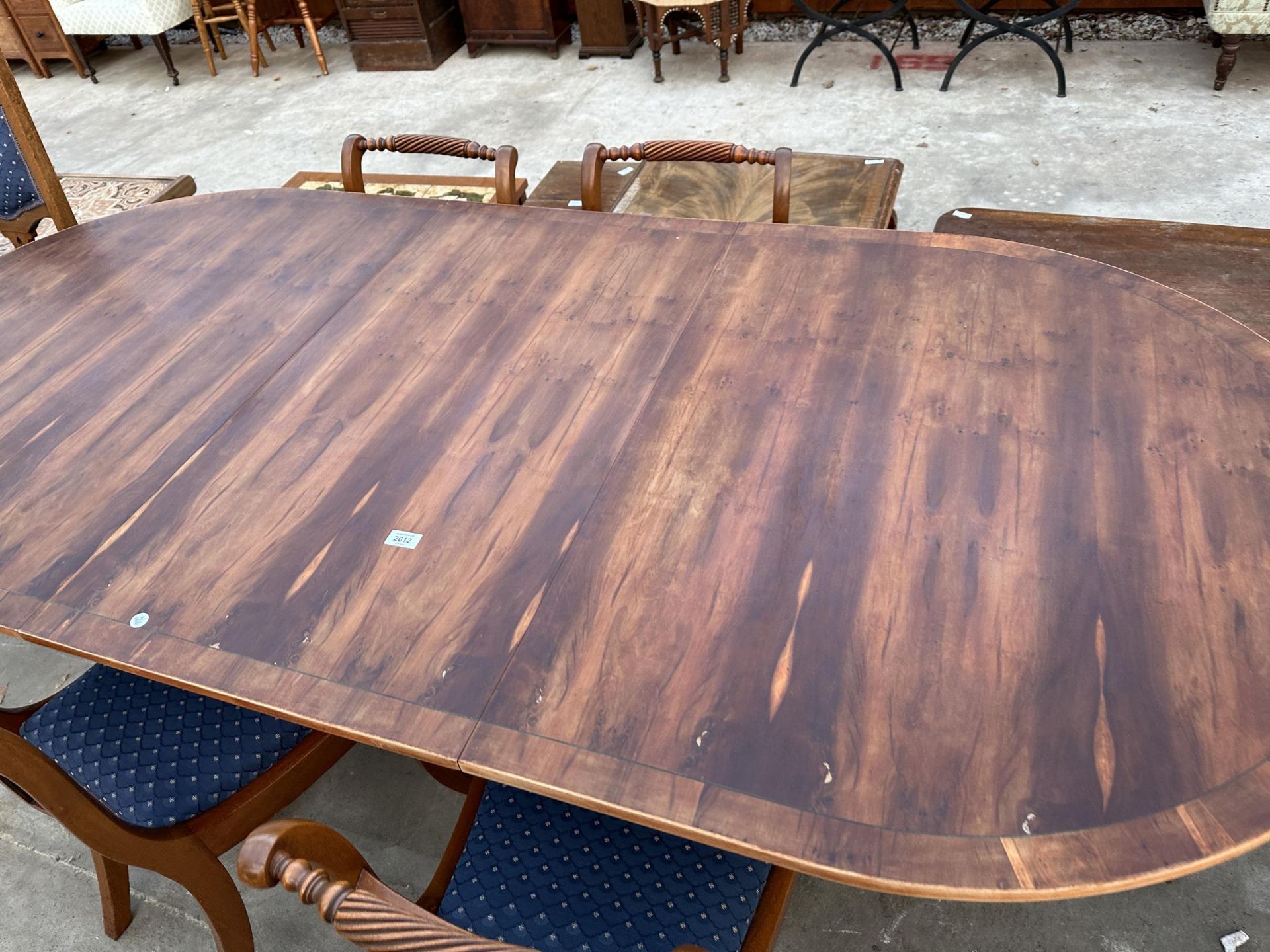 A REGENCY STYLE YEW WOOD CROSSBANDED TWIN PEDESTAL EXTENDING DINING TABLE 64" X 39.5" (LEAF 21.5") - Image 2 of 6