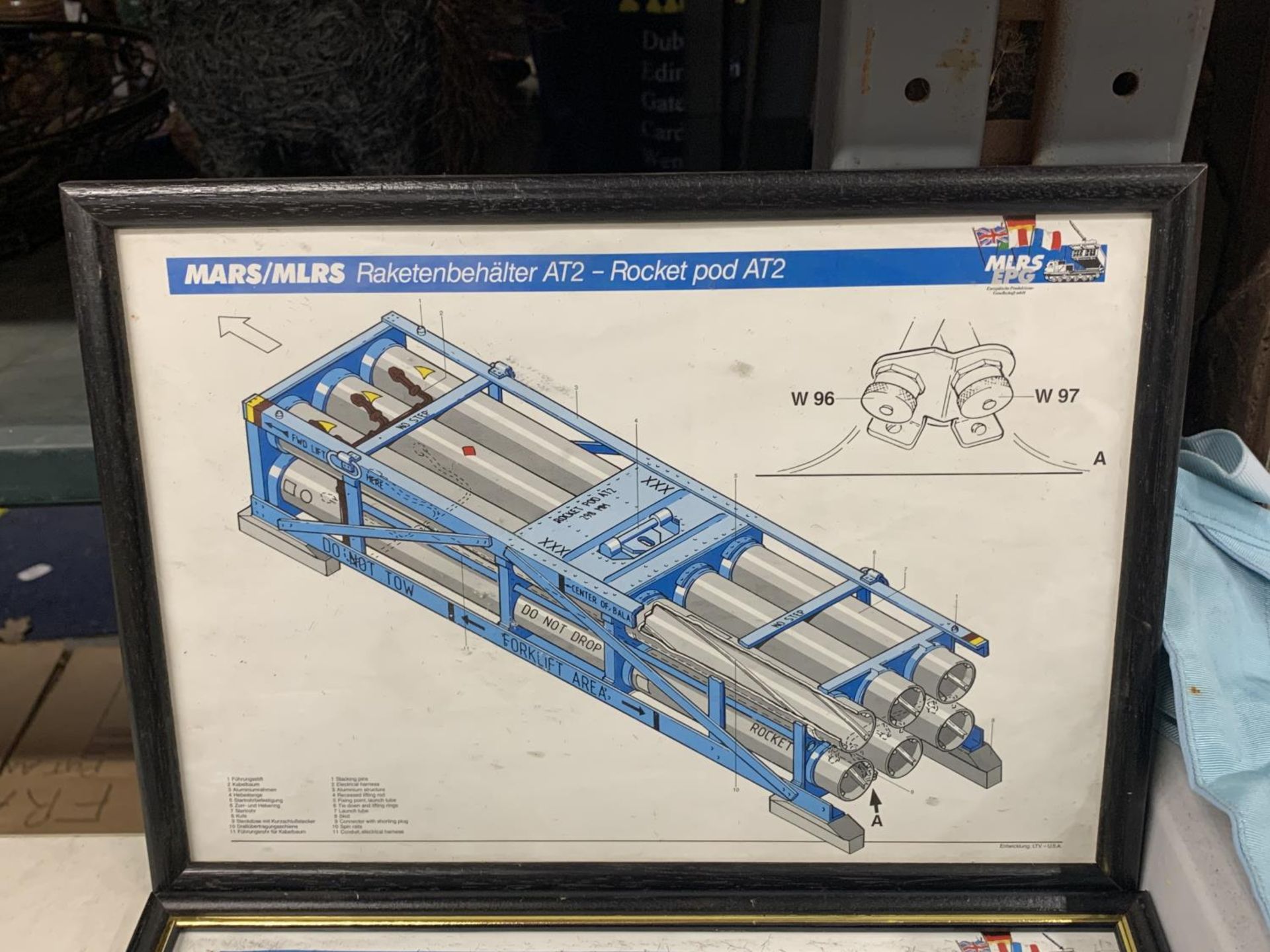 TWO FRAMED MILITARY PRINTS TO INCLUDE A ROCKET POD AT2 AND A CARRIER PLUS A PRINT OF A ROCKET - Image 2 of 3