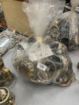 A LARGE QUANTITY OF UNSORTED COSTUME JEWELLERY - 7 KG IN TOTAL