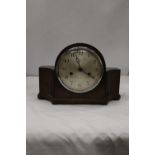 A VINTAGE GERMAN MANTLE CLOCK IN WORKING ORDER AT CATALOGUING, NO WARRANTY GIVEN