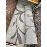 A SMALL GREY MODERN RUG