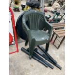FOUR PLASTIC STACKING GARDEN CHAIRS AND A TABLE