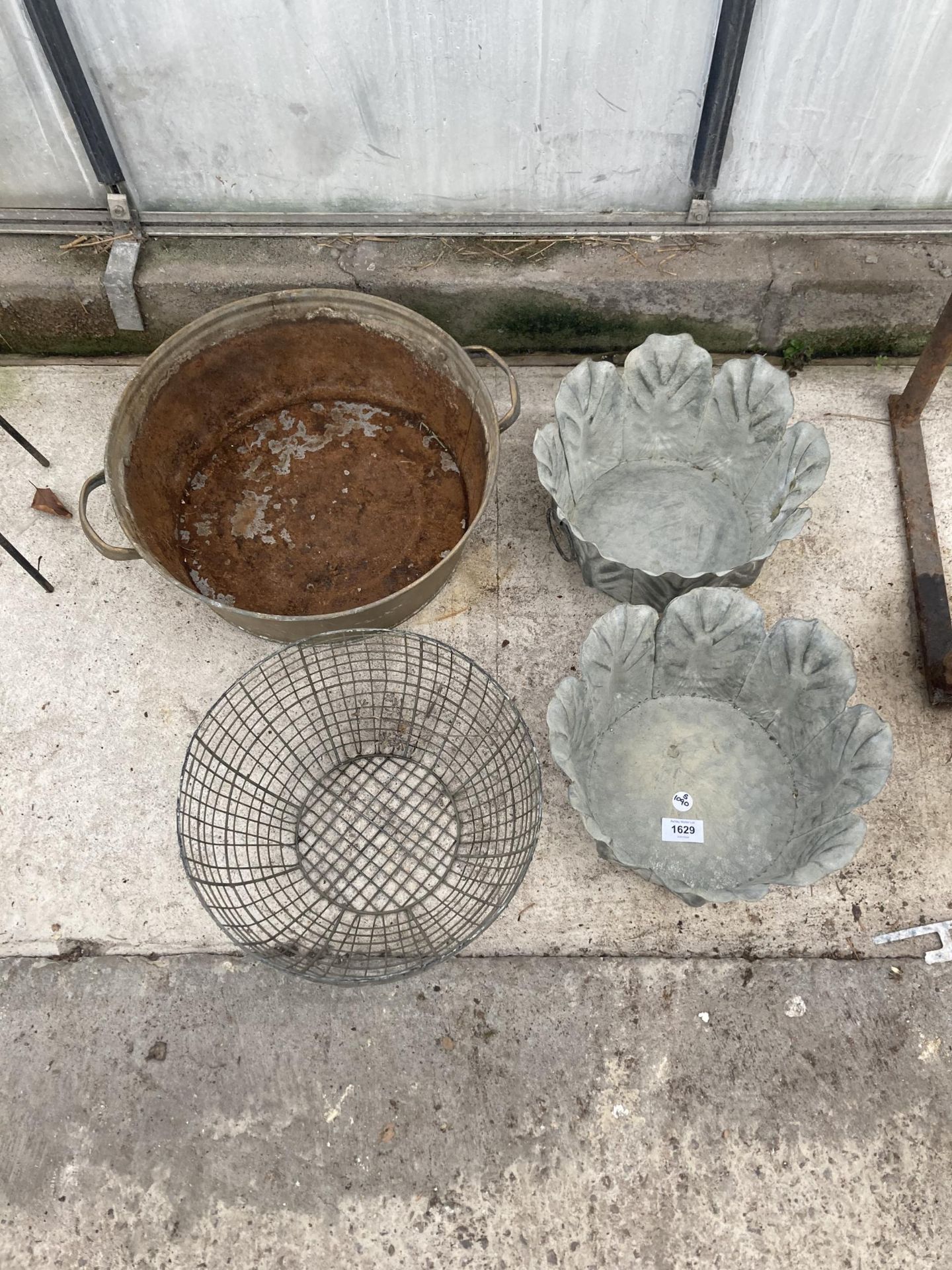 AN ASSORTMENT OF PLANTERS TO INCLUDE A SMALL TIN BATH ETC