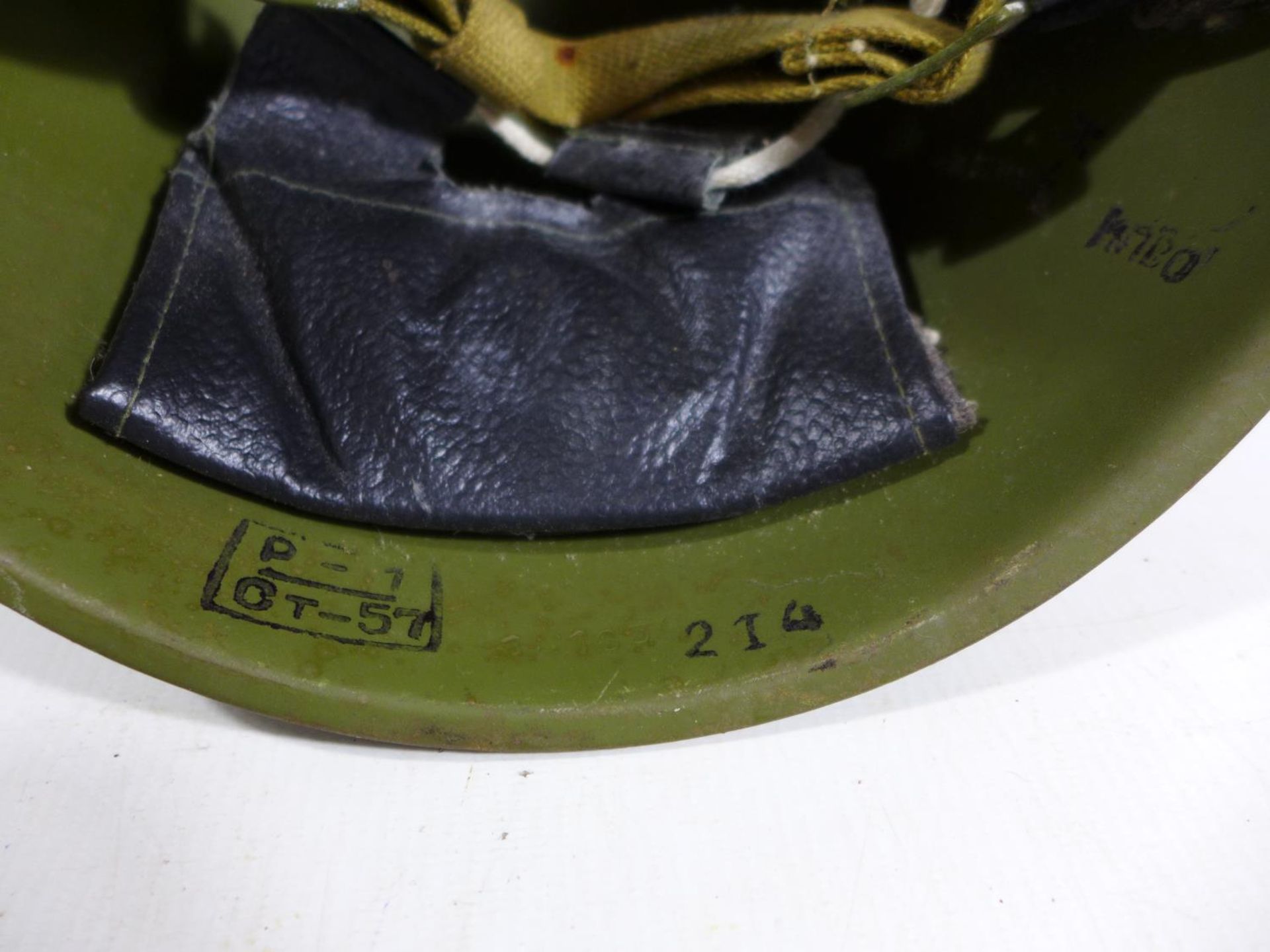 A GREEN PAINTED METAL MILITARY HELMET AND LINING - Image 5 of 5
