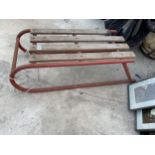 A VINTAGE METAL AND WOODEN SLATTED SLEDGE