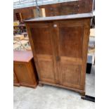 A 19TH CENTURY OAK TWO DOOR CUPBOARD ON BRACKET FEET, 39" WIDE