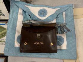 A MASONIMC APRON IN A LEATHER POUCH BELONGED TO BRO. A. DALE, GOULBURN LODGE, NO. 8478