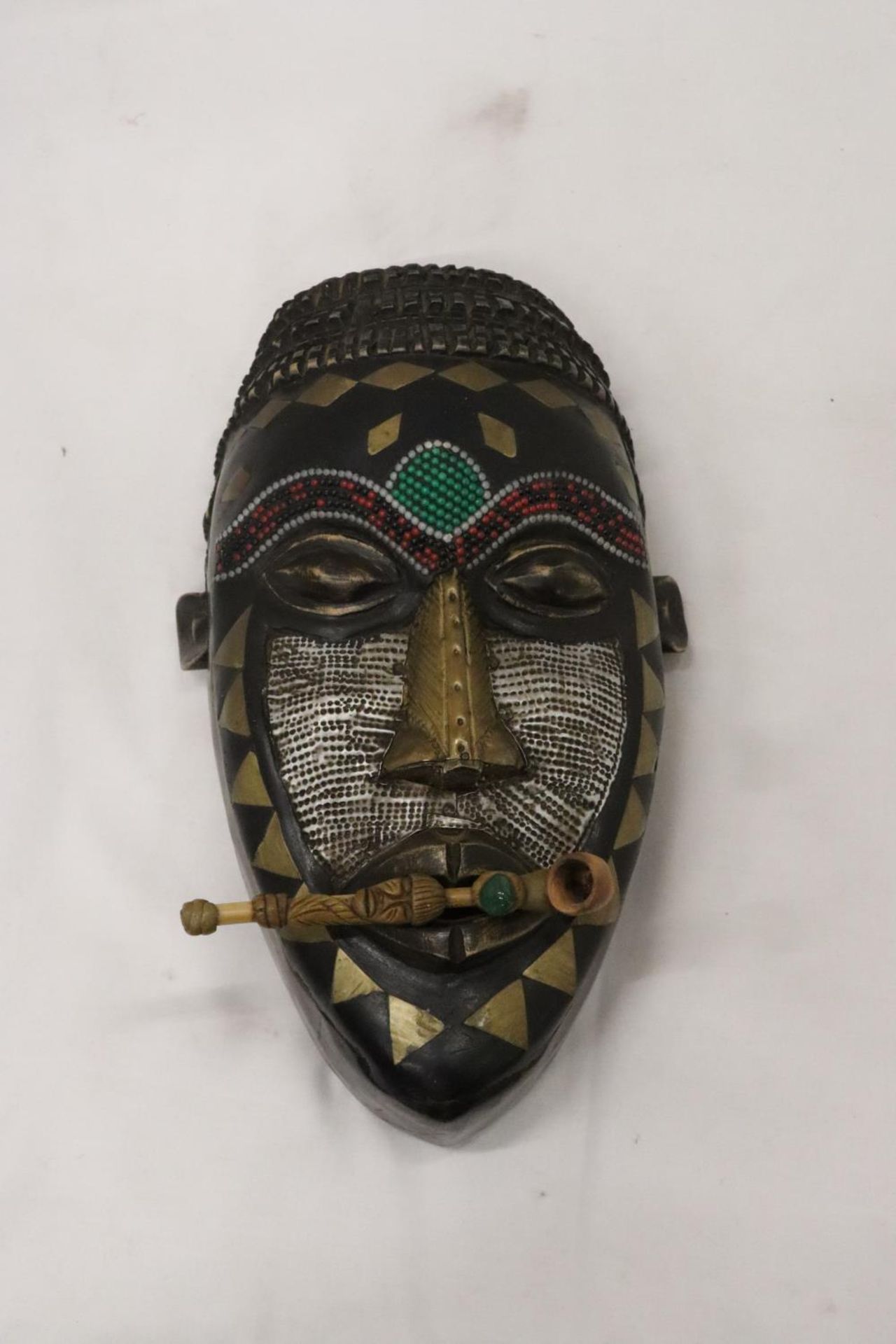 AN AFRICAN TRIBAL MASK, 29CM X 15CM PLUS A VINTAGE HANDMADE TRIBAL WOODEN PIPE
