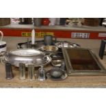 A LARGE QUANTITY OF SILVER PLATE TO INCLUDE A PHOTOFRAME, TRAY, SERVING DISH, SALT & PEPPER POTS,