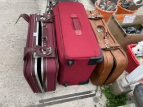 THREE VARIOUS SUITCASES