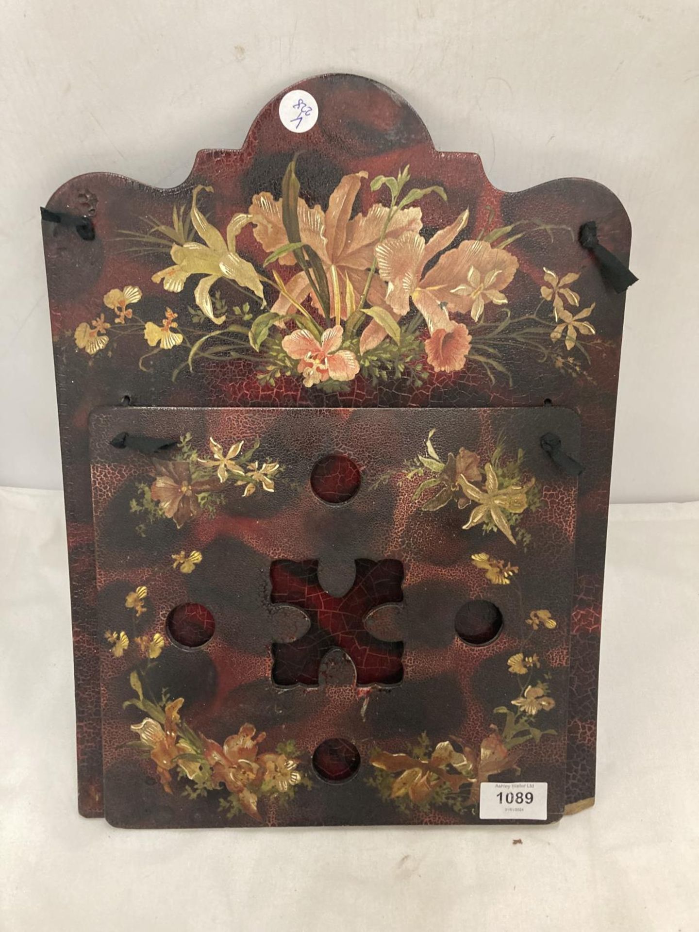 A VICTORIAN PAPIER MACHE WALL HANGING WITH HANDPAINTED FLORAL DESIGN