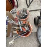 AN ASSORTMENT OF TOOLS TO INCLUDE TROWELS, CHISELS AND MIXERS ETC