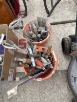 AN ASSORTMENT OF TOOLS TO INCLUDE TROWELS, CHISELS AND MIXERS ETC
