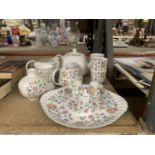 A QUANTITY OF MINTON 'HADDON HALL' TO INCLUDE A TEAPOT, WATER POT, CREAM JUGS, GOBLETS, CRUET SET,