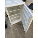 A WHITE UNDERCOUNTER FRIDGE