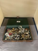 A SPANISH LEATHER BOX CONTAINING A QUANTITY OF COSTUME JEWELLERY VINTAGE AND MODERN EARRINGS