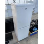 A WHITE BEKO UPRIGHT FRIDGE FREEZER