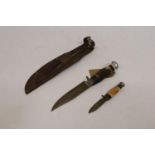 A TWIN KNIFE AND LEATHER SCABBARD, BLADES 13 AND 6CM