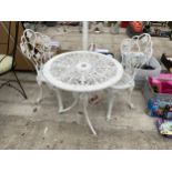 A VINTAGE CAST ALLOY BISTRO SET COMPRISING OF A ROUND TABLE AND TWO CHAIRS