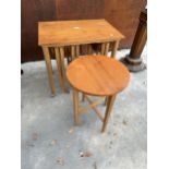 A PAUL HUNGERFORD TABLE HOUSING A NEST OF FOUR CIRCULAR DROP LEAF TABLES, EACH 15" DIAMETER