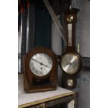 A VINTAGE MAHOGANY CASED MANTLE CLOCK AND BAROMETER