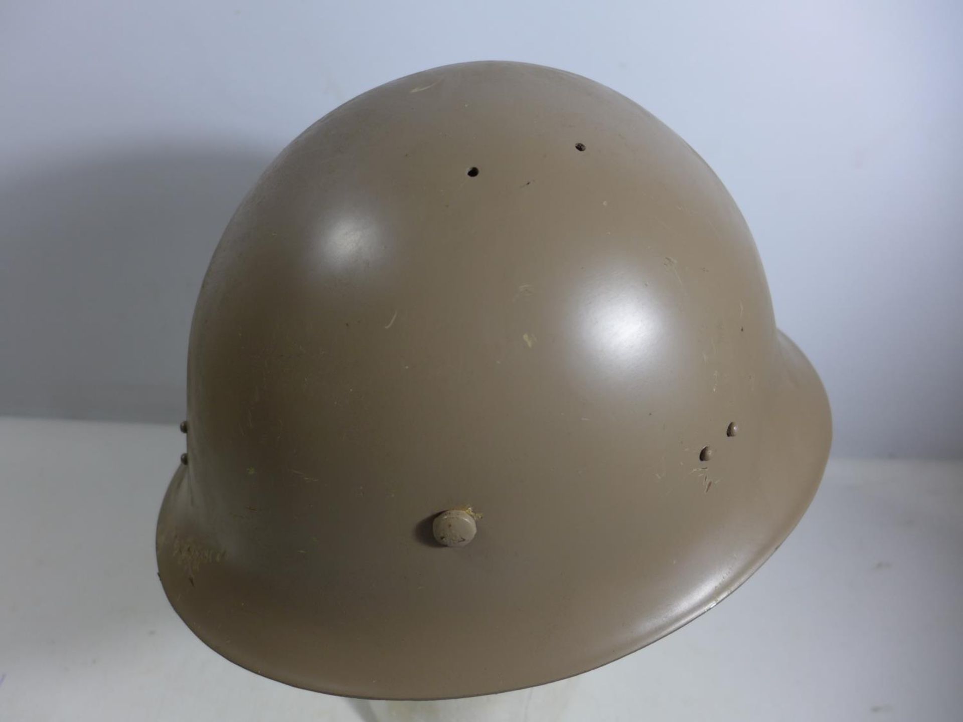 A PAINTED METAL MILITARY HELMET AND LINING - Image 2 of 3