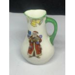 A MINIATURE ROYAL DOULTON JUG