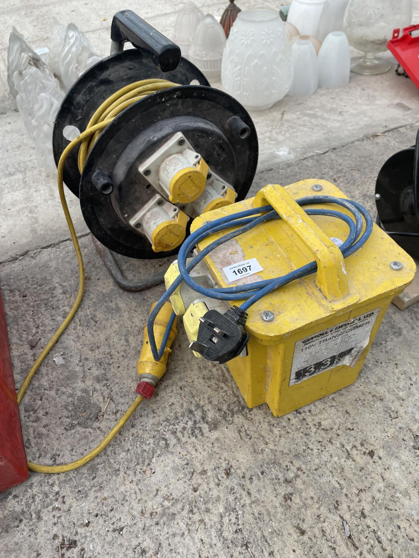 A 110V TRANSFORMER AND A 110V EXTENSION LEAD